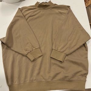 Fear of God- Essentials; women’s L sweatshirt; trad tan color w/ Essentials